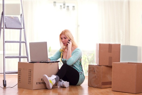 woman with packed boxes