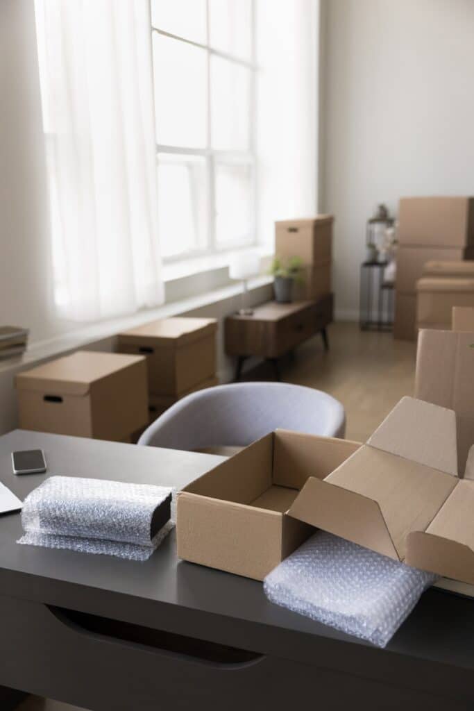 Boxes on a Desk in Preparation for Moving to a New Home