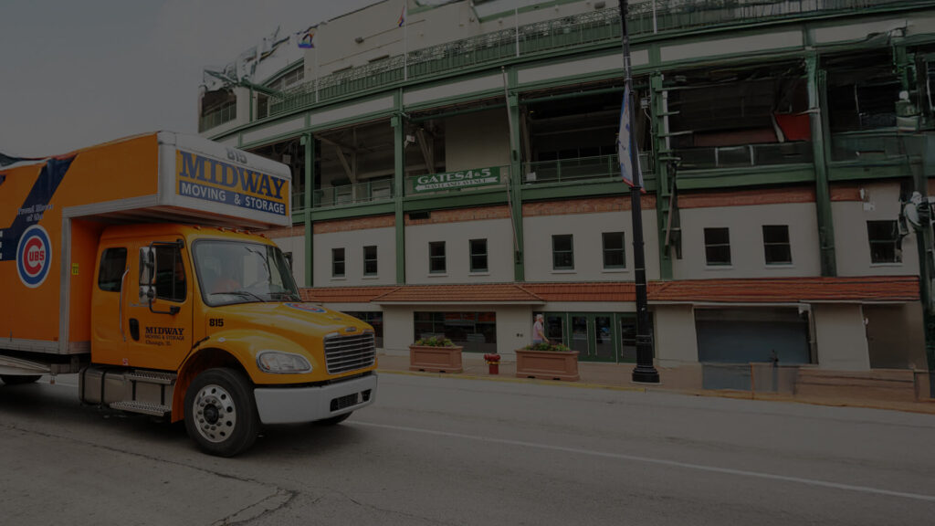A Midway moving truck in front of a storage facilty