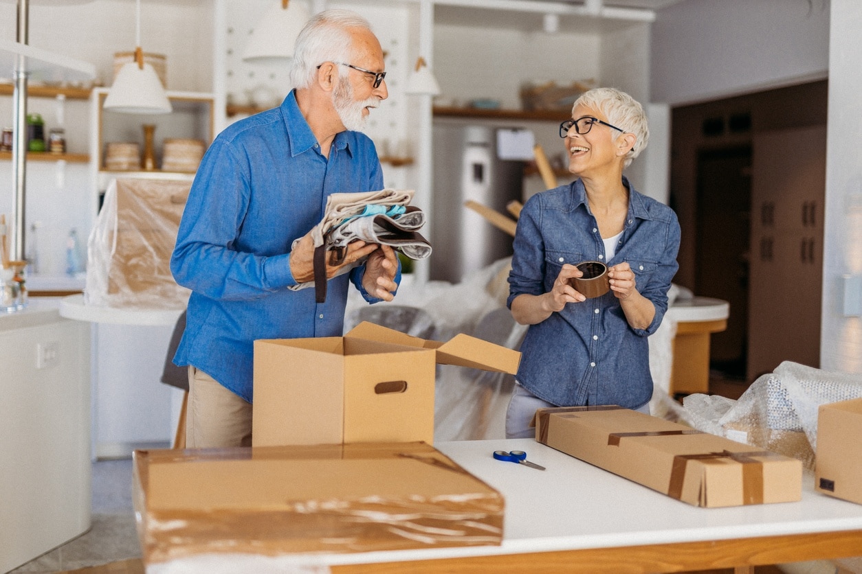 A Senior Couple Packing Boxes and Preparing to Move